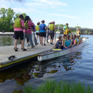 The Mississippi Sisters load in their boat on the Black River in La Crosse. 