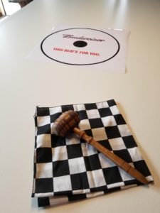 The official tick race track and smash gavel. 