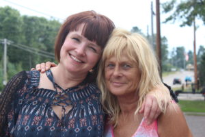 Melanie Cockrum and her cousin Barbi Carlson at a wave party in Arbor Vitae, Wisconsin. 