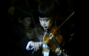 Eleven year-old Wayne Lin performs at the Weidner Center's debut performance in 1993. 