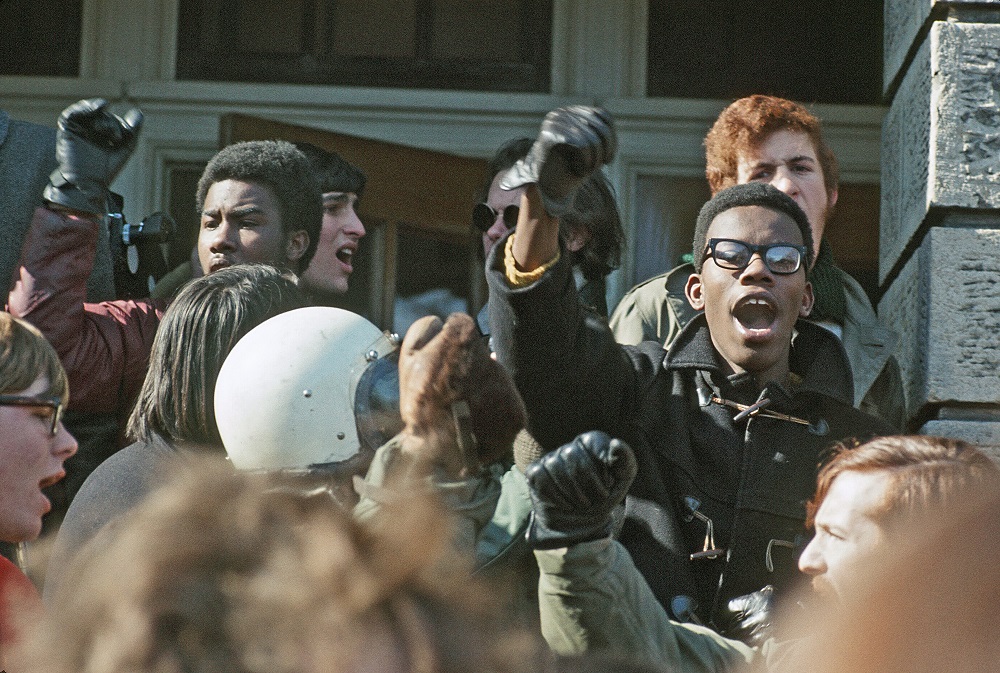 Students lead chanting at a rally in 1969. (Photo by John Wolf)