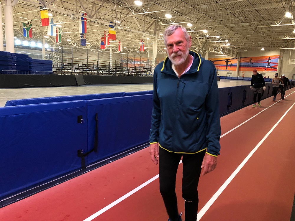 Cedarburg resident Jim Fiste ran nearly 256 miles during the Six Days in the Dome event at the Pettit National Ice Center in Milwaukee. (Corrinne Hess/WPR)