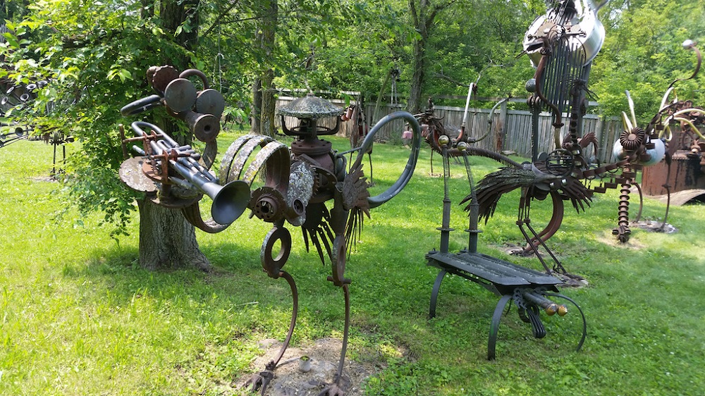 Metal sculpture birds with instruments. (Photo by <a href="https://www.flickr.com/photos/sixthstation/18878518153/" target="_blank" rel="noopener noreferrer">V'ron</a>)