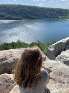 Kolberg's daughter looks out over Devil's Lake from the East Bluff. (Brad Kolberg/WPR)