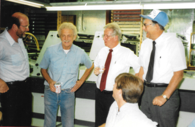 Quentin Smirl (third from left) with his partner (far right) and employees. (Courtesy of Nancy Jorgensen)